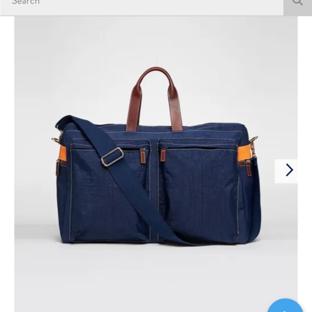 J McLaughlin sailcloth weekender bag.